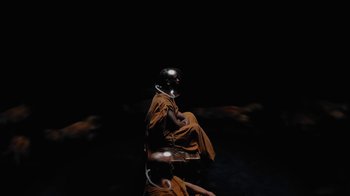 Movie still from “Travis Scott - FE!N” (2024), directed by Gabriel Moses – Wide shot, Overhead angle