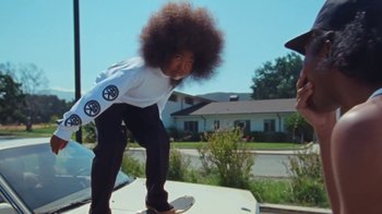 Movie still from “A$AP Rocky - Kids Turned Out Fine” (2019), directed by Dexter Navy – Medium shot, Low angle