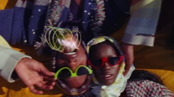 Movie still from “A$AP Rocky - Kids Turned Out Fine” (2019), directed by Dexter Navy – Extreme Close Up shot, Low angle