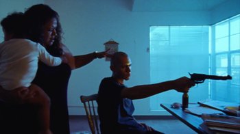 Movie still from “A$AP Rocky - Kids Turned Out Fine” (2019), directed by Dexter Navy – Medium shot, Low angle