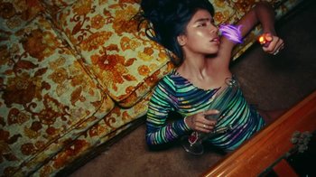 Movie still from “A$AP Rocky - Kids Turned Out Fine” (2019), directed by Dexter Navy – Medium shot, Overhead angle