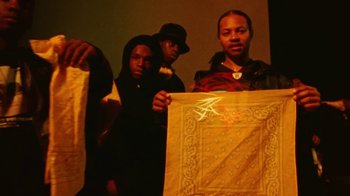 Movie still from “A$AP Rocky - Kids Turned Out Fine” (2019), directed by Dexter Navy – Medium shot, Low angle