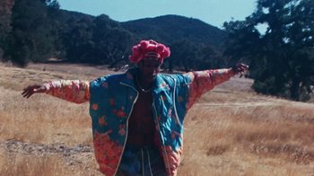 Movie still from “A$AP Rocky - Kids Turned Out Fine” (2019), directed by Dexter Navy – Medium shot, High angle