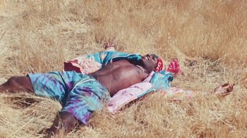 Movie still from “A$AP Rocky - Kids Turned Out Fine” (2019), directed by Dexter Navy – Medium shot, Overhead angle