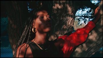 Movie still from “A$AP Rocky - Kids Turned Out Fine” (2019), directed by Dexter Navy – Medium shot, Low angle