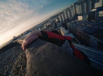 Movie still from “DJ Pone (ft. Blasé) - All I Want” (2023), directed by Benoît Marzouvanlian – Extreme Close Up shot, Low angle