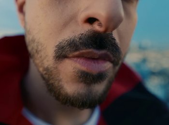Movie still from “DJ Pone (ft. Blasé) - All I Want” (2023), directed by Benoît Marzouvanlian – Extreme Close Up shot, High angle