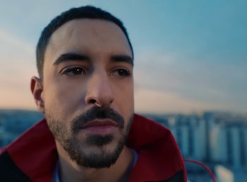 Movie still from “DJ Pone (ft. Blasé) - All I Want” (2023), directed by Benoît Marzouvanlian – Close Up shot, Low angle