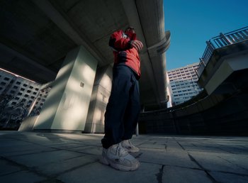 Movie still from “DJ Pone (ft. Blasé) - All I Want” (2023), directed by Benoît Marzouvanlian – Wide shot, Low angle