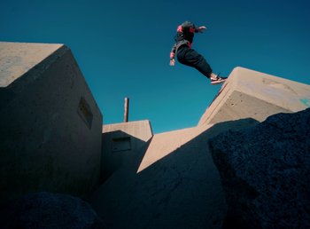 Movie still from “DJ Pone (ft. Blasé) - All I Want” (2023), directed by Benoît Marzouvanlian – Wide shot, Low angle
