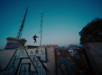 Movie still from “DJ Pone (ft. Blasé) - All I Want” (2023), directed by Benoît Marzouvanlian – Extreme Wide shot, Low angle