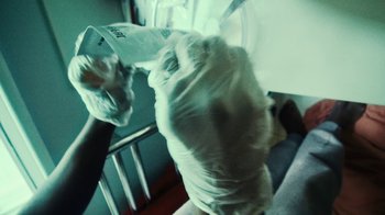 Movie still from “Downtown Kayoto - Lite” (2023), directed by Joe Howat – Extreme Close Up shot, Overhead angle