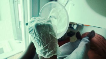 Movie still from “Downtown Kayoto - Lite” (2023), directed by Joe Howat – Extreme Close Up shot, Overhead angle