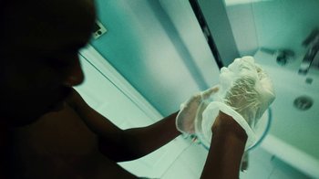 Movie still from “Downtown Kayoto - Lite” (2023), directed by Joe Howat – Extreme Close Up shot, Overhead angle