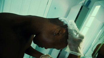 Movie still from “Downtown Kayoto - Lite” (2023), directed by Joe Howat – Extreme Close Up shot, Low angle