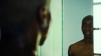 Movie still from “Downtown Kayoto - Lite” (2023), directed by Joe Howat – Extreme Close Up shot, Over the shoulder angle
