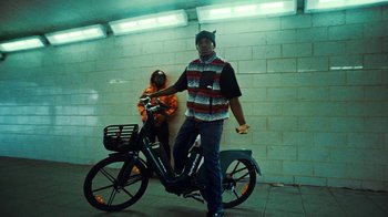 Movie still from “Downtown Kayoto - Lite” (2023), directed by Joe Howat – Wide shot, Low angle
