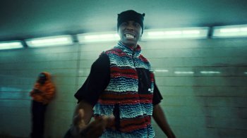 Movie still from “Downtown Kayoto - Lite” (2023), directed by Joe Howat – Medium shot, Low angle