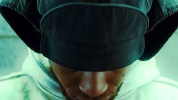 Movie still from “Downtown Kayoto - Lite” (2023), directed by Joe Howat – Extreme Close Up shot, Overhead angle