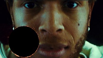 Movie still from “Downtown Kayoto - Lite” (2023), directed by Joe Howat – Extreme Close Up shot, Low angle