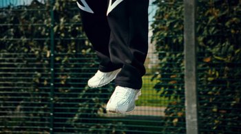 Movie still from “Downtown Kayoto - Lite” (2023), directed by Joe Howat – Medium shot, Low angle