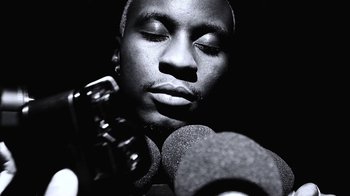 Movie still from “Downtown Kayoto - Lite” (2023), directed by Joe Howat – Close Up shot, Low angle