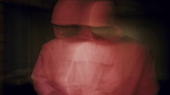 Movie still from “Downtown Kayoto - Lite” (2023), directed by Joe Howat – Extreme Close Up shot, High angle