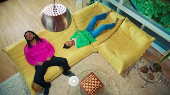 Movie still from “Aminé - Charmander” (2021), directed by Jack Begert – Wide shot, Overhead angle