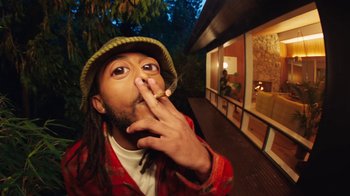 Movie still from “Aminé - Charmander” (2021), directed by Jack Begert – Medium shot, Overhead angle