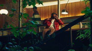 Movie still from “Aminé - Charmander” (2021), directed by Jack Begert – Medium shot, Low angle
