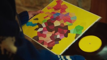 Movie still from “Aminé - Charmander” (2021), directed by Jack Begert – Extreme Close Up shot, Overhead angle