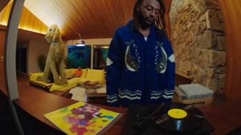 Movie still from “Aminé - Charmander” (2021), directed by Jack Begert – Medium shot, High angle