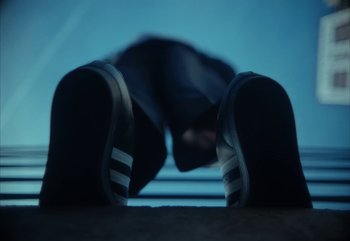 Movie still from “YUNGBLUD feat. Lil Yachty - When We Die” (2024), directed by Logan Fields – Extreme Close Up shot, Overhead angle