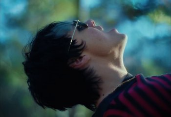 Movie still from “YUNGBLUD feat. Lil Yachty - When We Die” (2024), directed by Logan Fields – Close Up shot, Low angle