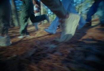 Movie still from “YUNGBLUD feat. Lil Yachty - When We Die” (2024), directed by Logan Fields – Extreme Close Up shot, High angle