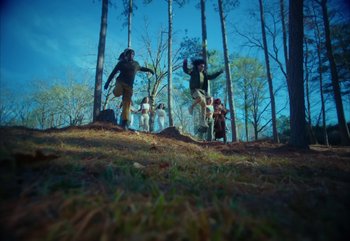 Movie still from “YUNGBLUD feat. Lil Yachty - When We Die” (2024), directed by Logan Fields – Extreme Wide shot, Low angle
