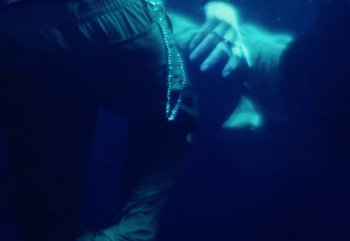 Movie still from “YUNGBLUD feat. Lil Yachty - When We Die” (2024), directed by Logan Fields – Extreme Close Up shot, Overhead angle