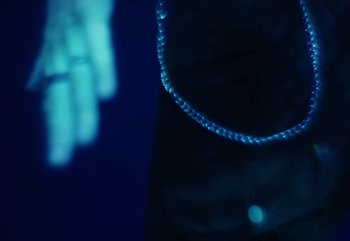 Movie still from “YUNGBLUD feat. Lil Yachty - When We Die” (2024), directed by Logan Fields – Extreme Close Up shot, Overhead angle