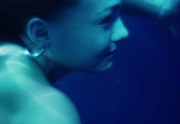 Movie still from “YUNGBLUD feat. Lil Yachty - When We Die” (2024), directed by Logan Fields – Extreme Close Up shot, High angle