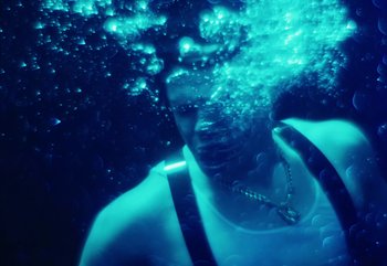 Movie still from “YUNGBLUD feat. Lil Yachty - When We Die” (2024), directed by Logan Fields – Extreme Close Up shot, Overhead angle