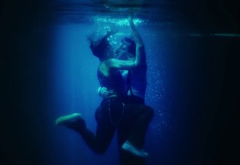 Movie still from “YUNGBLUD feat. Lil Yachty - When We Die” (2024), directed by Logan Fields – Wide shot, Overhead angle
