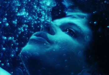 Movie still from “YUNGBLUD feat. Lil Yachty - When We Die” (2024), directed by Logan Fields – Extreme Close Up shot, Overhead angle