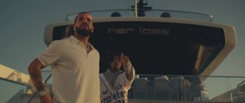 Movie still from “Drake, 21 Savage - Spin Bout U” (2023), directed by Dave Meyers – Medium shot, Over the shoulder angle