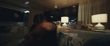 Movie still from “Drake, 21 Savage - Spin Bout U” (2023), directed by Dave Meyers – Medium shot, Over the shoulder angle