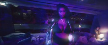 Movie still from “Drake, 21 Savage - Spin Bout U” (2023), directed by Dave Meyers – Medium shot, Low angle