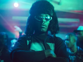 Movie still from “Lil Uzi Vert - Just Wanna Rock” (2022), directed by Gibson Hazard – Close Up shot, Low angle