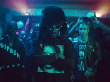 Movie still from “Lil Uzi Vert - Just Wanna Rock” (2022), directed by Gibson Hazard – Medium shot, Low angle