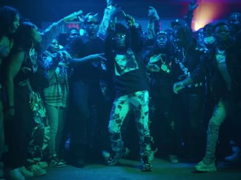 Movie still from “Lil Uzi Vert - Just Wanna Rock” (2022), directed by Gibson Hazard – Wide shot, Low angle