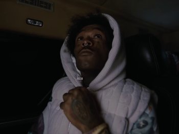 Movie still from “Lil Uzi Vert - Just Wanna Rock” (2022), directed by Gibson Hazard – Close Up shot, Low angle
