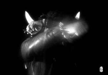 Movie still from “Ken Carson - Fighting My Demons” (2023), directed by Cole Bennett – Extreme Close Up shot, Overhead angle